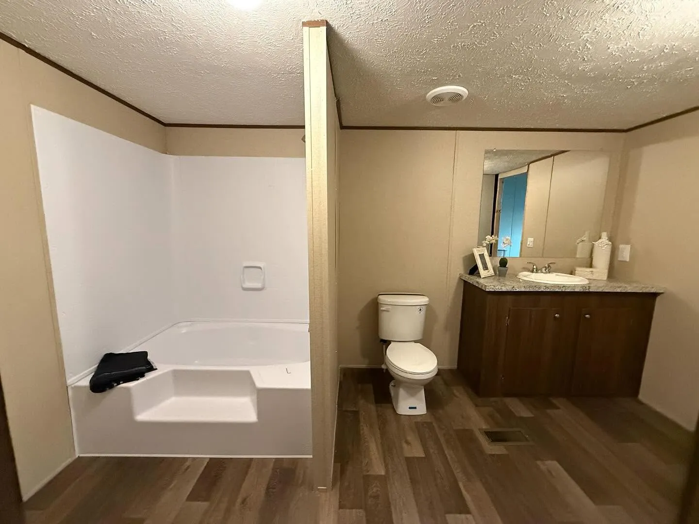Primary bathroom with garden tub and vanity